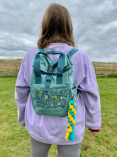 Load image into Gallery viewer, Spring Dogs Backpack for Dog Lovers and Owners- colourful embroidered compact rucksack for your adventures