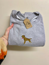 Load image into Gallery viewer, a grey sweatshirt with a full colour embroidered border terrier embroidered in the centre holding a rose in their mouth.
