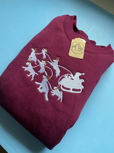 Dogs Pulling Santa’s Sleigh Sweatshirt - Festive dogs sweater for dog lovers